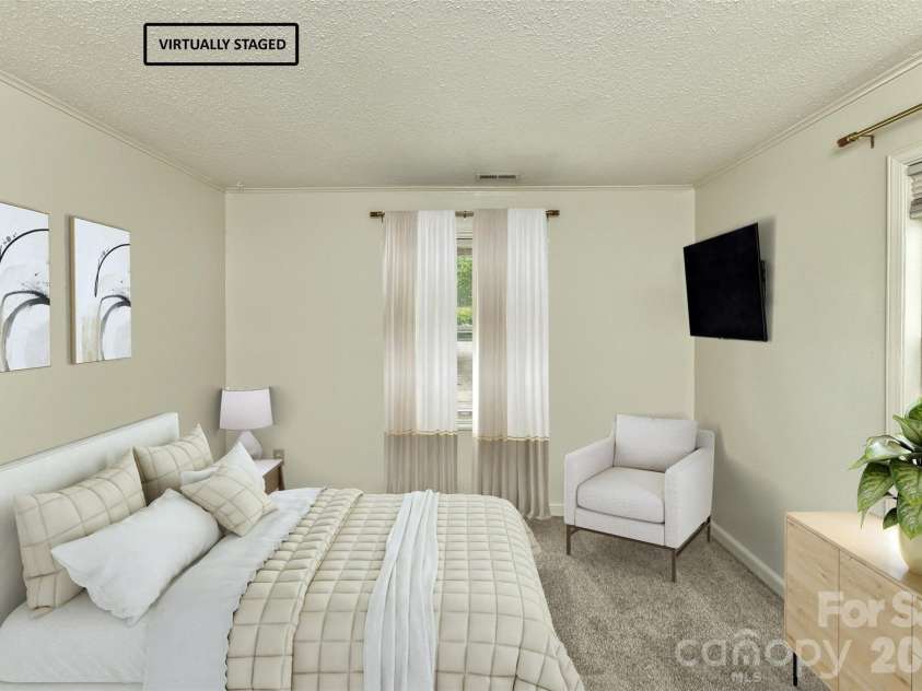 7 Teaneck Circle, Hendersonville, NC 28791.  MLS# CAR4369967, YatesRealty ID 22283. Primary Bedroom