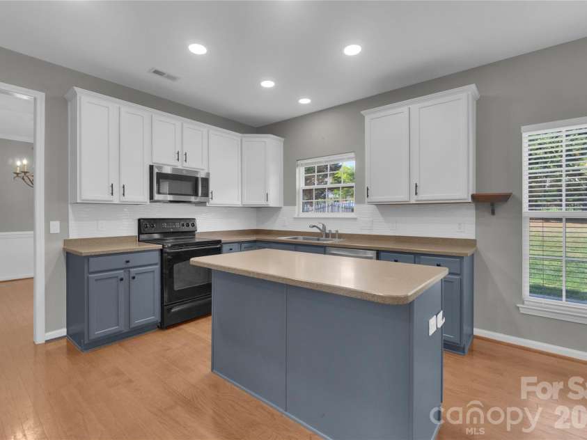 1007 Butterburr Drive, Matthews, NC 28104.  MLS# CAR4380724, YatesRealty ID 22290. 