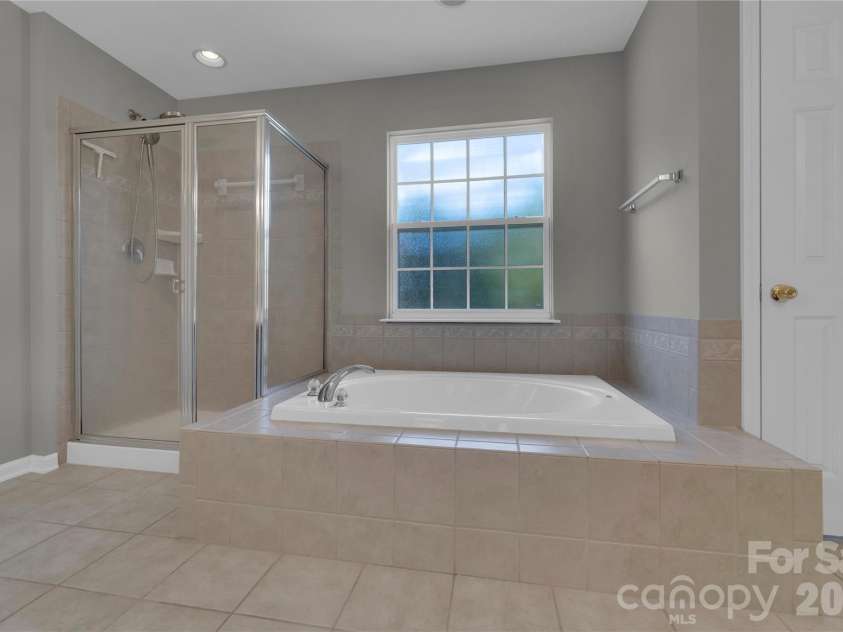 1007 Butterburr Drive, Matthews, NC 28104.  MLS# CAR4380724, YatesRealty ID 22290. 