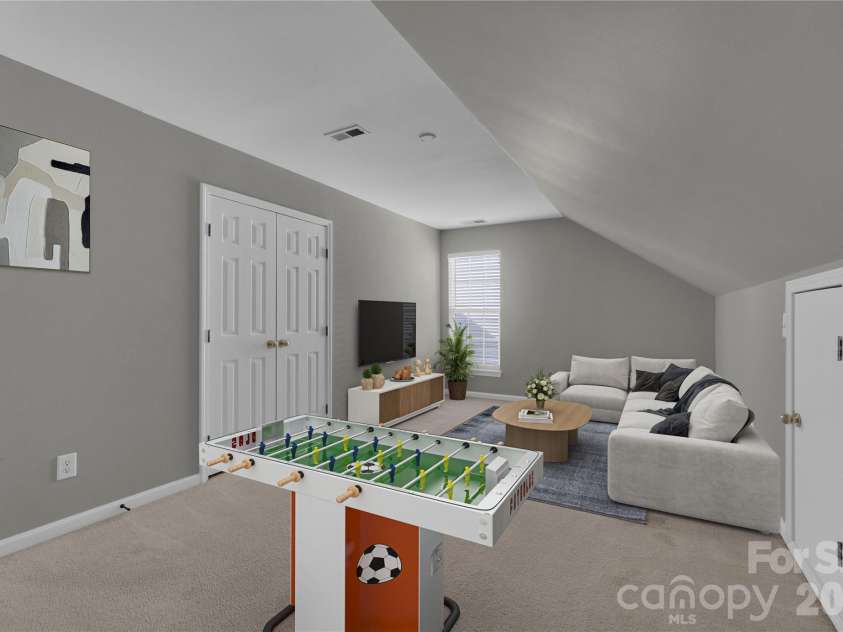 1007 Butterburr Drive, Matthews, NC 28104.  MLS# CAR4380724, YatesRealty ID 22290. Virtually staged photo