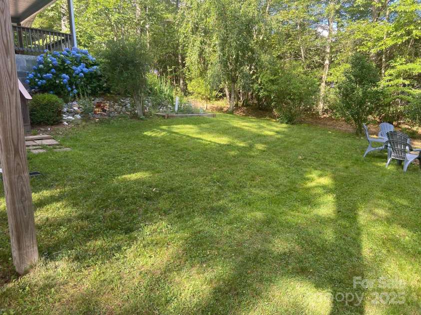 151 Wipprecht Drive, Spruce Pine, NC 28777.  MLS# CAR4272917, YatesRealty ID 22294. Back yard