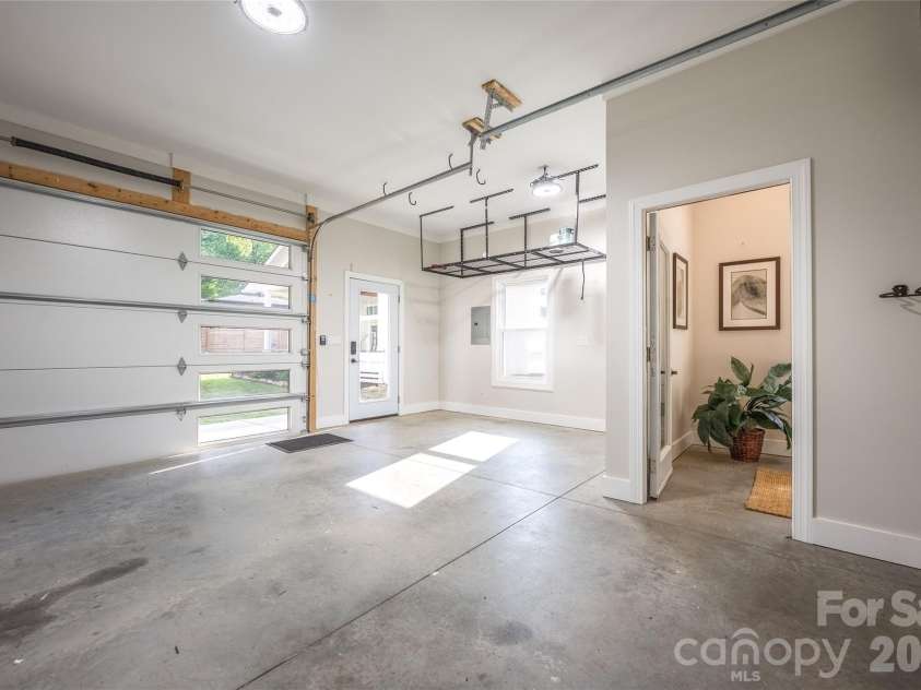 4601 General Pershing Drive, Charlotte, NC 28209.  MLS# CAR4379524, YatesRealty ID 22296. Detached garage with space for a vehicle, storage, and a flex room