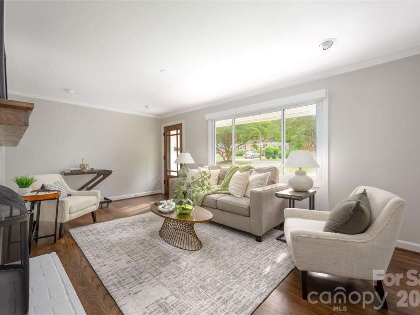4601 General Pershing Drive, Charlotte, NC 28209.  MLS# CAR4379524, YatesRealty ID 22296. Living Room with Fireplace