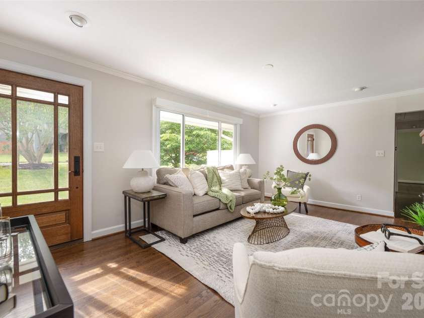 4601 General Pershing Drive, Charlotte, NC 28209.  MLS# CAR4379524, YatesRealty ID 22296. Mahogany wood door 