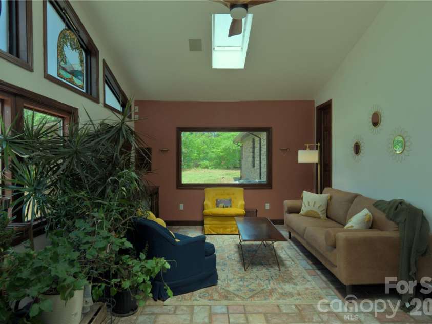 6870 Lowder Road, Salisbury, NC 28147.  MLS# CAR4368281, YatesRealty ID 22298. Large sunroom with lots of windows/light