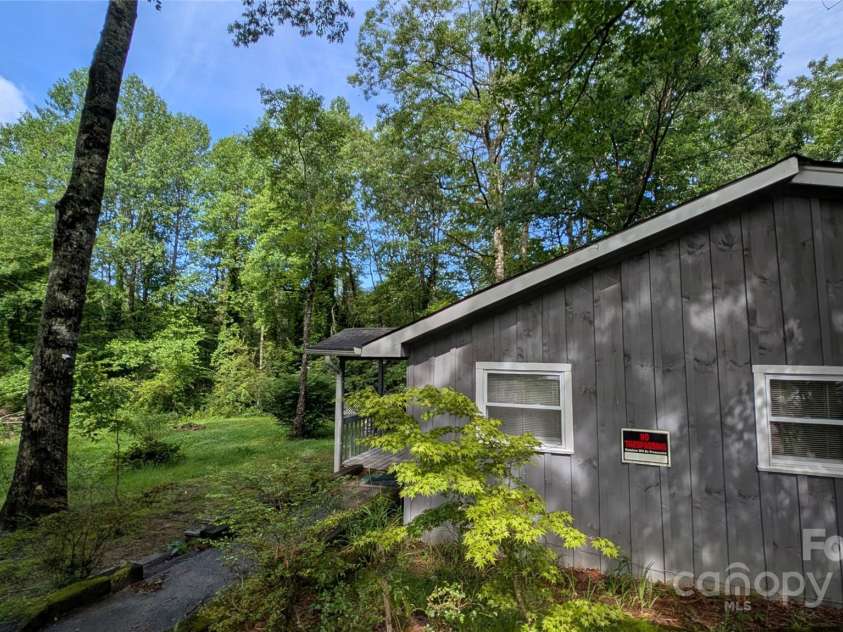242 Upper Whitewater Road, Sapphire, NC 28774.  MLS# CAR4273367, YatesRealty ID 22299. 