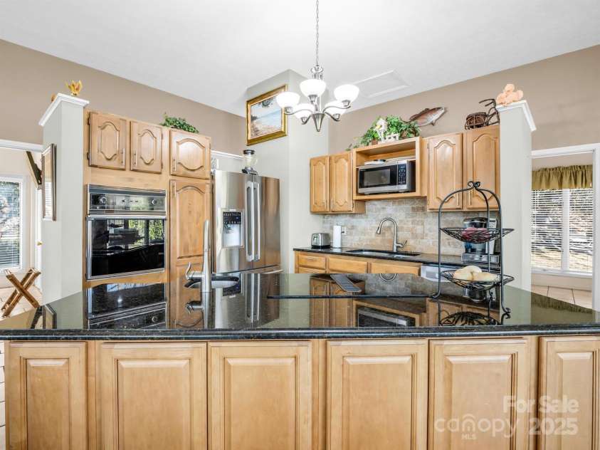 828 Foster Hill Drive, Hendersonville, NC 28739.  MLS# CAR4271476, YatesRealty ID 22307. 