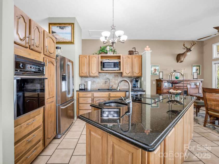 828 Foster Hill Drive, Hendersonville, NC 28739.  MLS# CAR4271476, YatesRealty ID 22307. 