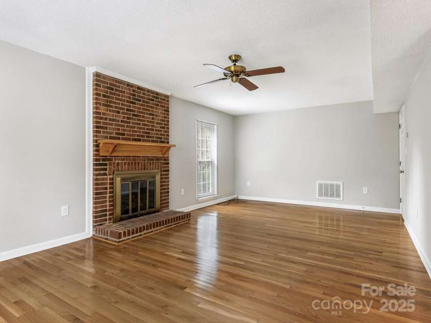 9701 Kent Village Drive, Charlotte, NC 28269.  MLS# CAR4309656, YatesRealty ID 22309. Living Room