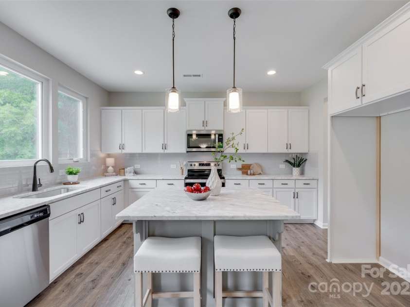 5305 Friendly Baptist Church Road, Indian Trail, NC 28079.  MLS# CAR4255673, YatesRealty ID 22310. Beautiful Kitchen with tons of counter and cabinet space, and island with extra seating