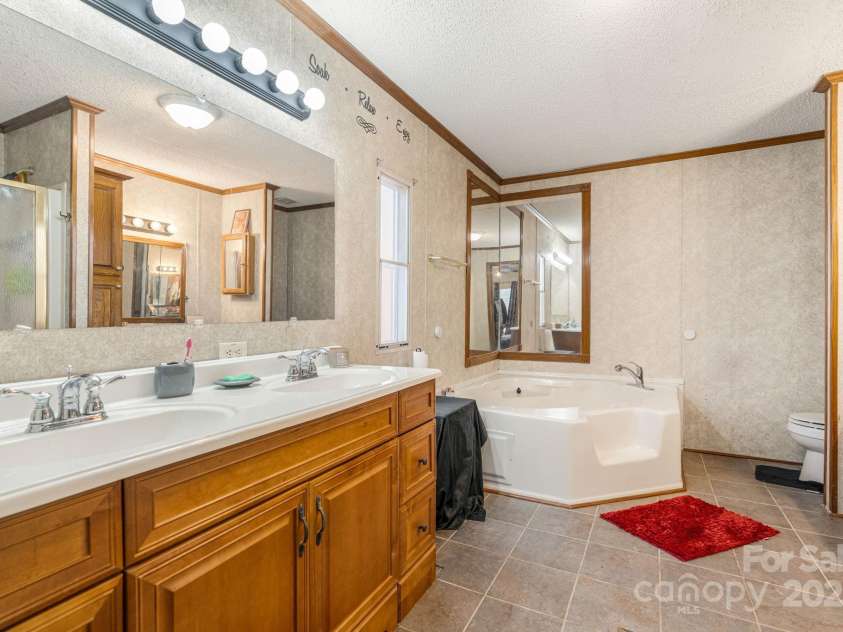 31 Grassy Hills Drive, Marion, NC 28752.  MLS# CAR4265404, YatesRealty ID 22311. 