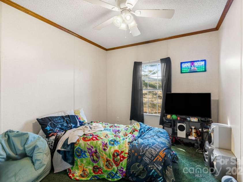 31 Grassy Hills Drive, Marion, NC 28752.  MLS# CAR4265404, YatesRealty ID 22311. 