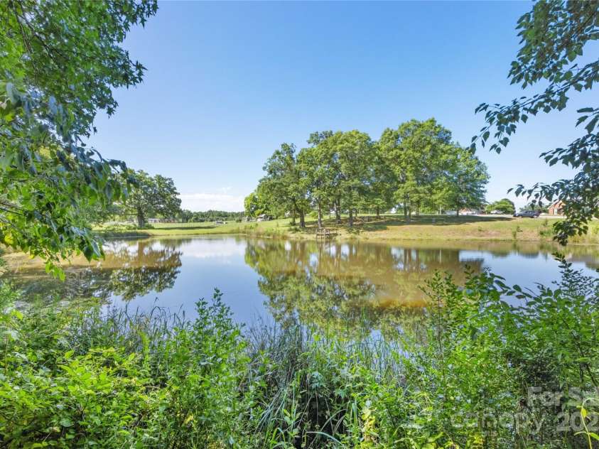 5710 Lander Benton Road, Unionville, NC 28110.  MLS# CAR4254913, YatesRealty ID 22313. Your own Personal Pond