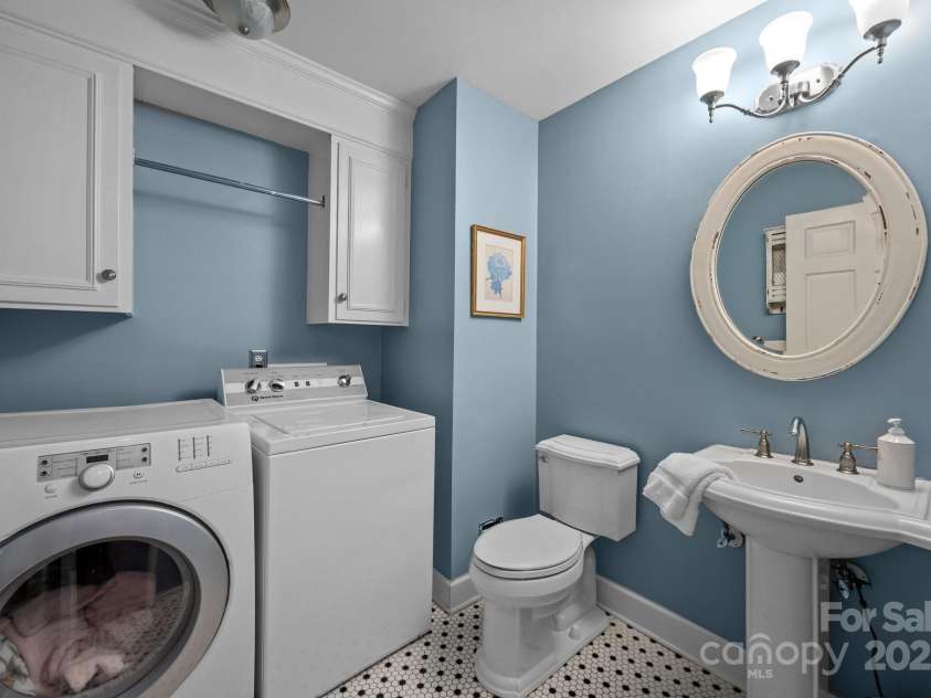 5510 Sardis Road, Charlotte, NC 28270.  MLS# CAR4240440, YatesRealty ID 22316. Downstairs Laundry Room and Bathroom
