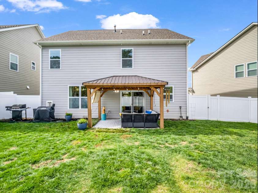 383 Fox Cove Road, Hendersonville, NC 28792.  MLS# CAR4363125, YatesRealty ID 22318. Backyard Covered Patio