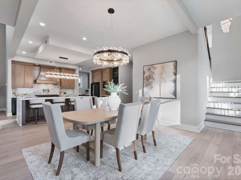 475 Canvasback Road, Mooresville, NC 28117.  MLS# CAR4366182, YatesRealty ID 22319. Dining area flows easily from the custom kitchen