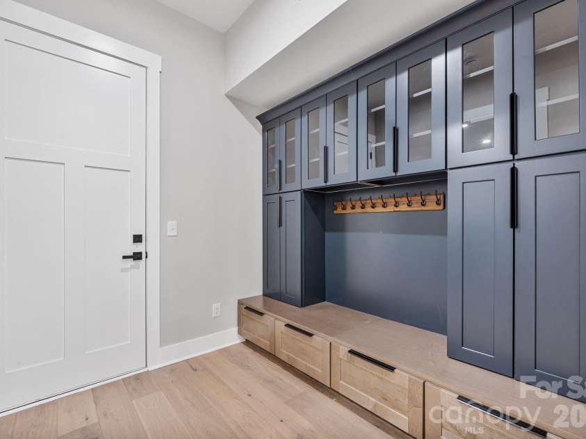 475 Canvasback Road, Mooresville, NC 28117.  MLS# CAR4366182, YatesRealty ID 22319. Drop-zone with ample built-ins positioned as you enter from the garage