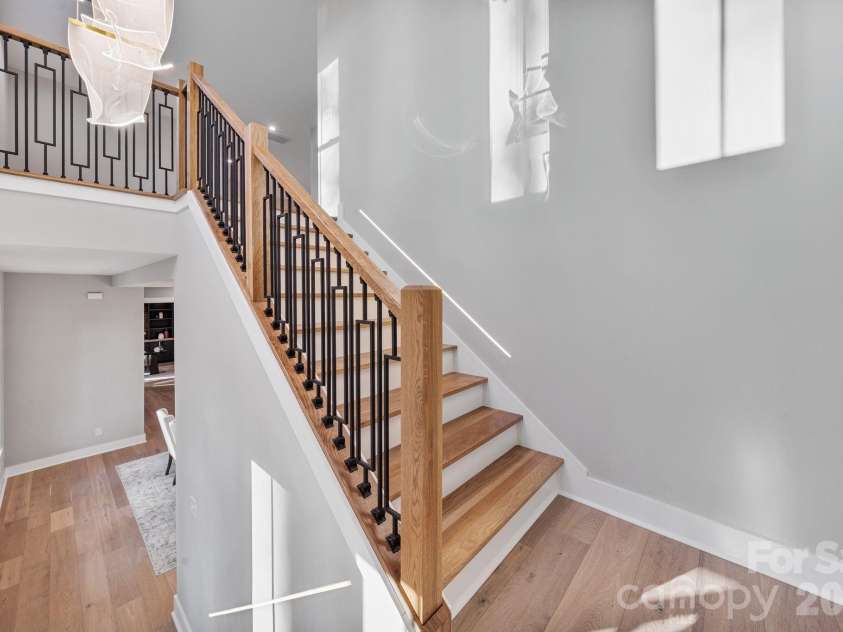 475 Canvasback Road, Mooresville, NC 28117.  MLS# CAR4366182, YatesRealty ID 22319. Engineered hardwood floors throughout and custom stair railing