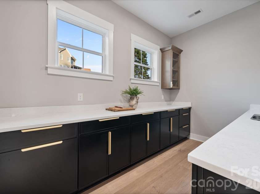 475 Canvasback Road, Mooresville, NC 28117.  MLS# CAR4366182, YatesRealty ID 22319. Scullery features, sink, and additional dishwasher