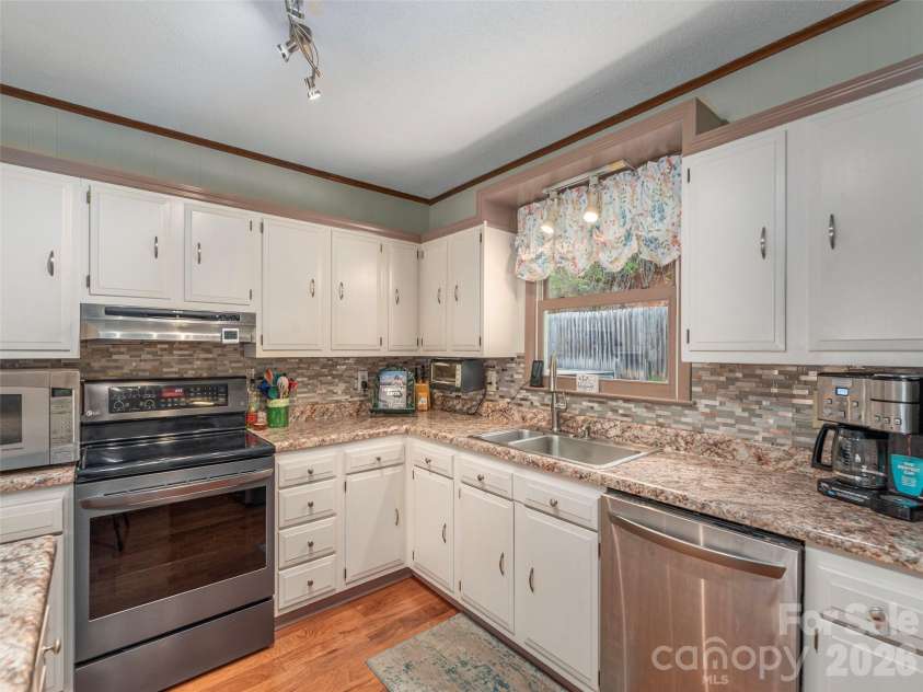 444 Martin Branch Road, Leicester, NC 28748.  MLS# CAR4369223, YatesRealty ID 22320. 