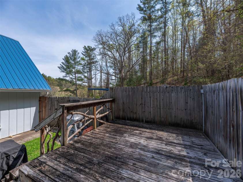 444 Martin Branch Road, Leicester, NC 28748.  MLS# CAR4369223, YatesRealty ID 22320. Secondary backyard deck