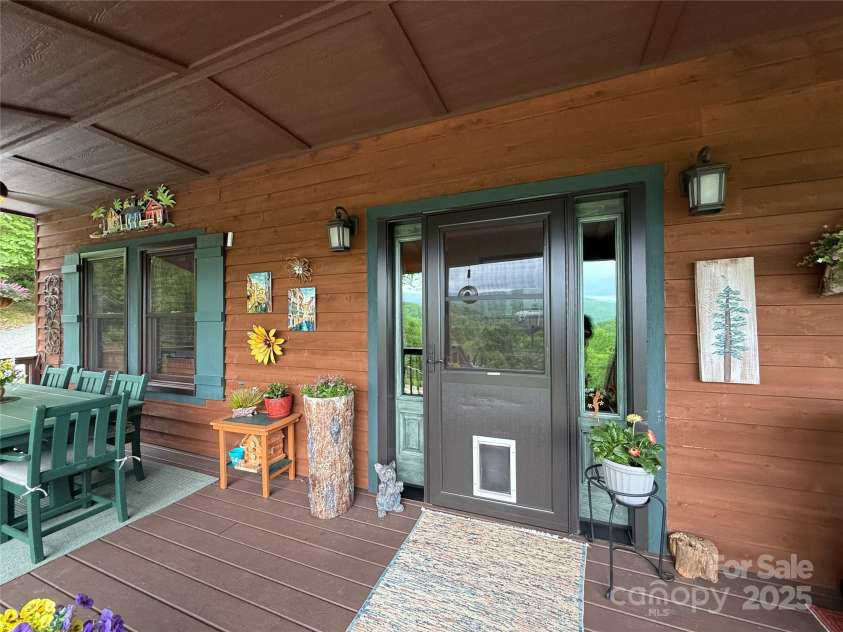 394 Hummingbird Lane, Elk Park, NC 28622.  MLS# CAR4268287, YatesRealty ID 22325. Front Porch/Deck