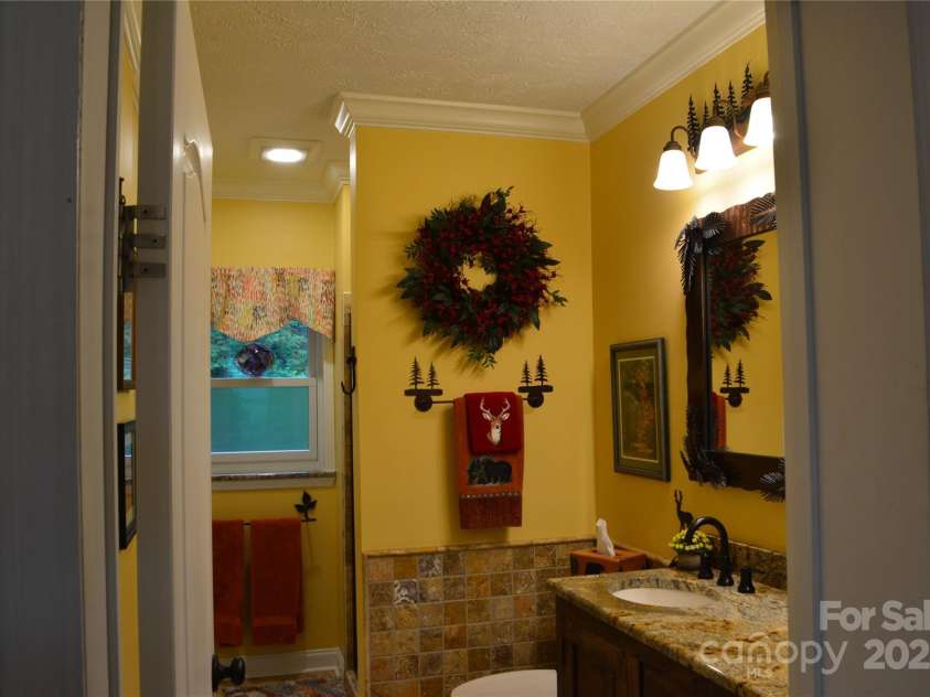 394 Hummingbird Lane, Elk Park, NC 28622.  MLS# CAR4268287, YatesRealty ID 22325. Master Bath, 1st Floor