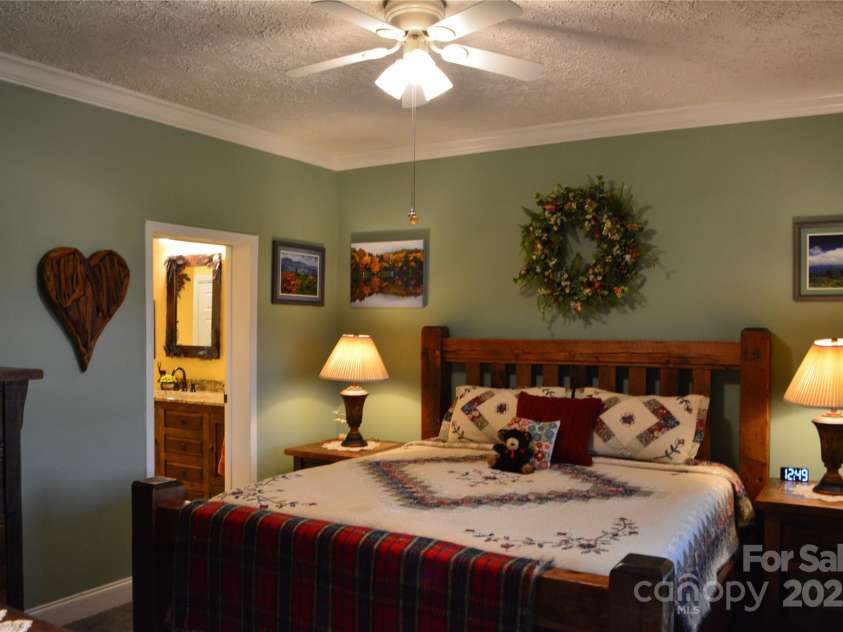394 Hummingbird Lane, Elk Park, NC 28622.  MLS# CAR4268287, YatesRealty ID 22325. Master Bedroom, 1st Floor