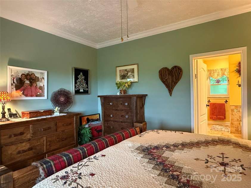 394 Hummingbird Lane, Elk Park, NC 28622.  MLS# CAR4268287, YatesRealty ID 22325. Master Bedroom, 1st Floor