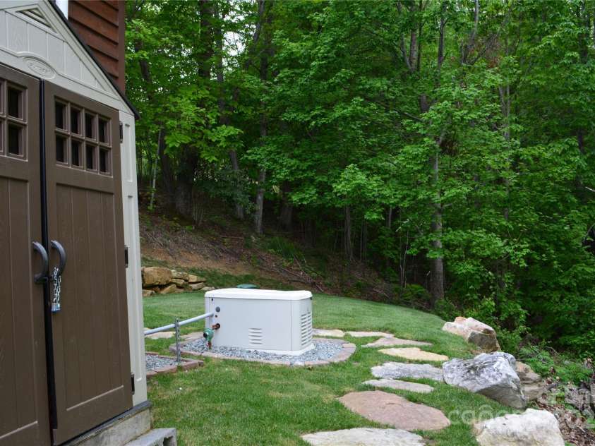 394 Hummingbird Lane, Elk Park, NC 28622.  MLS# CAR4268287, YatesRealty ID 22325. Storage Building/Generator