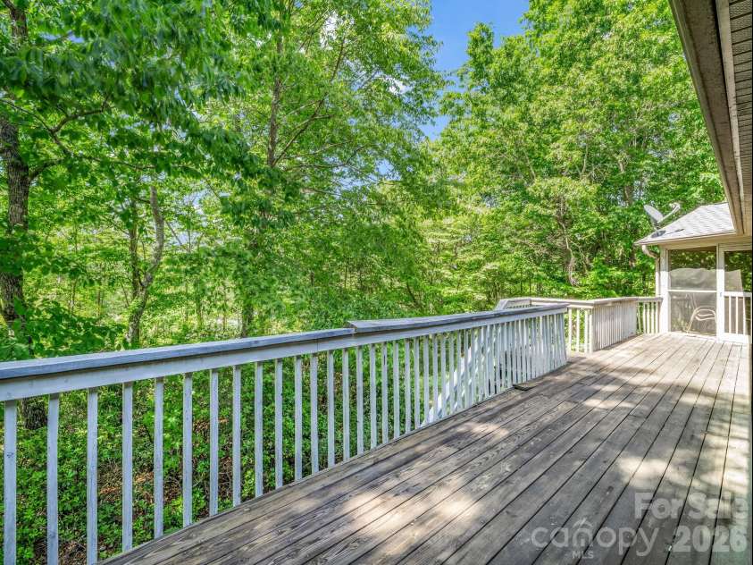 120 Lakewood Drive, Lake Lure, NC 28746.  MLS# CAR4378996, YatesRealty ID 22332. Deck view from primary BR