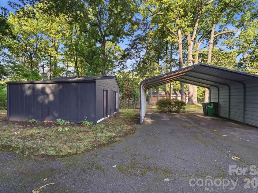 4314 Ivanhoe Place, Charlotte, NC 28205.  MLS# CAR4379977, YatesRealty ID 22333. 20x20 carport and 20x20 shed.