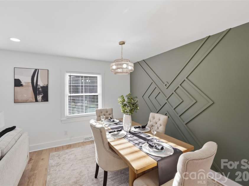 4314 Ivanhoe Place, Charlotte, NC 28205.  MLS# CAR4379977, YatesRealty ID 22333. Beautiful accent wall in dining area