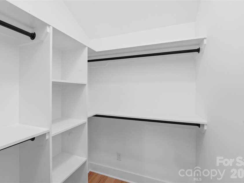 4314 Ivanhoe Place, Charlotte, NC 28205.  MLS# CAR4379977, YatesRealty ID 22333. Primary custom built in closet.