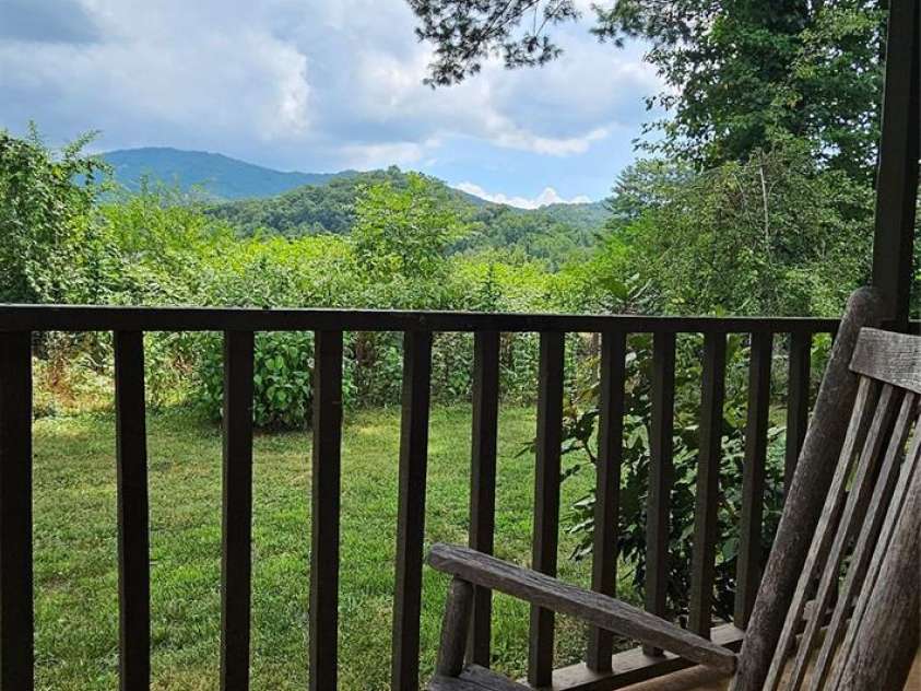 205 Blackwood Road, Cullowhee, NC 28723.  MLS# CAR4249157, YatesRealty ID 22339. Beautiful Mountain View from Front Porch