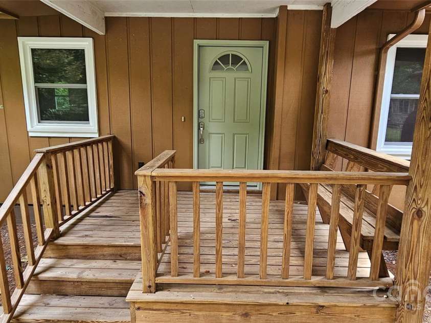 205 Blackwood Road, Cullowhee, NC 28723.  MLS# CAR4249157, YatesRealty ID 22339. Carport Entrance with new door