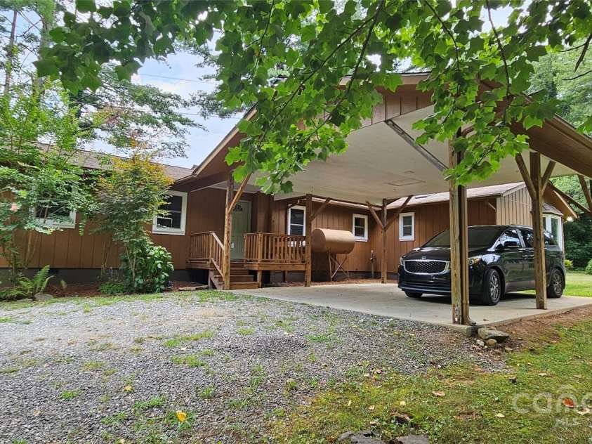 205 Blackwood Road, Cullowhee, NC 28723.  MLS# CAR4249157, YatesRealty ID 22339. Driveway view from road