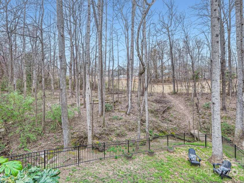 1005 Forbishire Drive, Matthews, NC 28104.  MLS# CAR4228629, YatesRealty ID 2234. Backyard View