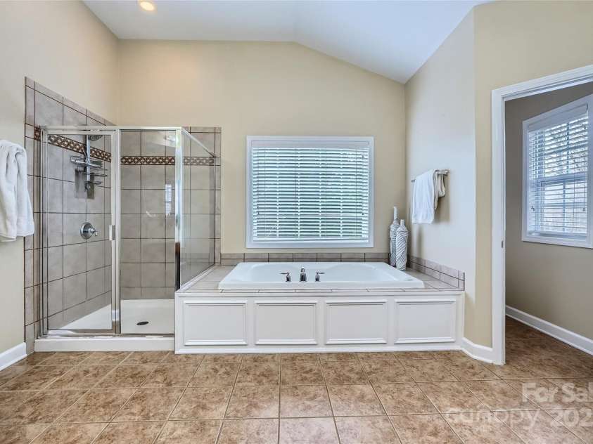 1005 Forbishire Drive, Matthews, NC 28104.  MLS# CAR4228629, YatesRealty ID 2234. Primary Bathroom