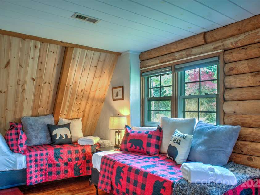756 Price Road, Hendersonville, NC 28739.  MLS# CAR4208399, YatesRealty ID 22341. Bedroom two with 2 more twin beds