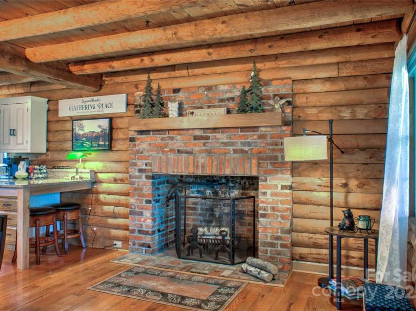756 Price Road, Hendersonville, NC 28739.  MLS# CAR4208399, YatesRealty ID 22341. Fireplace in Entry/Dining area