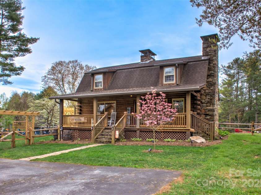 756 Price Road, Hendersonville, NC 28739.  MLS# CAR4208399, YatesRealty ID 22341. Front of cabin