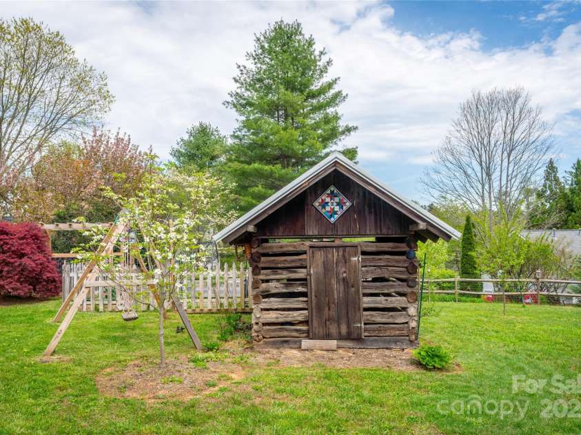 756 Price Road, Hendersonville, NC 28739.  MLS# CAR4208399, YatesRealty ID 22341. Historic corn crib from Saluda