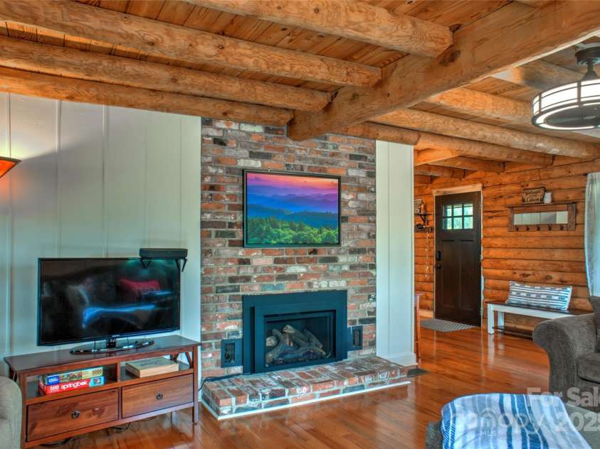 756 Price Road, Hendersonville, NC 28739.  MLS# CAR4208399, YatesRealty ID 22341. Living Room looking at front door entry