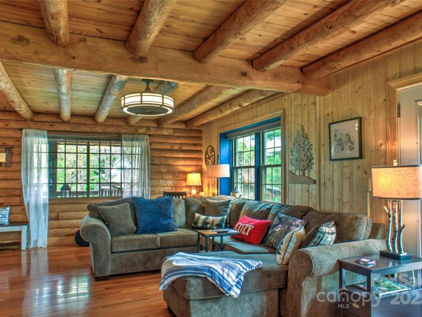 756 Price Road, Hendersonville, NC 28739.  MLS# CAR4208399, YatesRealty ID 22341. Living Room with lots of windows for natural light