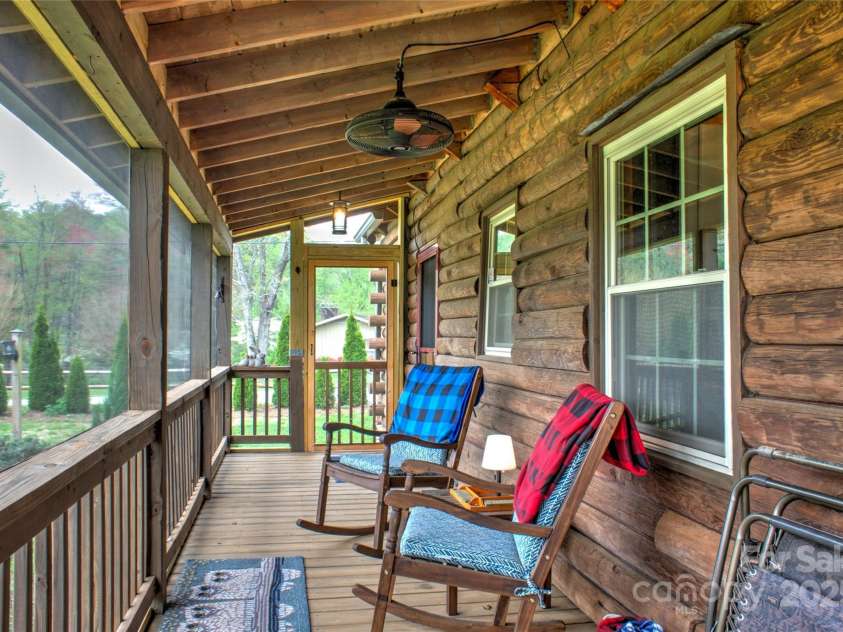 756 Price Road, Hendersonville, NC 28739.  MLS# CAR4208399, YatesRealty ID 22341. Screened-in Back Porch