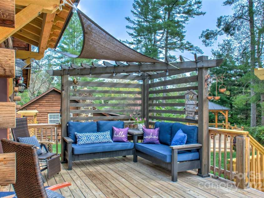 756 Price Road, Hendersonville, NC 28739.  MLS# CAR4208399, YatesRealty ID 22341. Side deck & Pergola, East entry