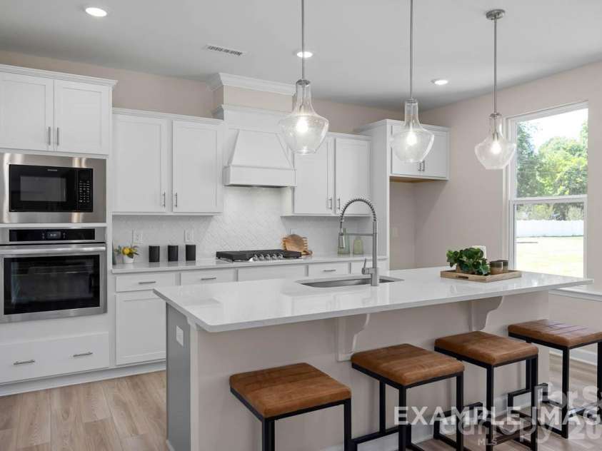 2917 audubon Ridge, Belmont, NC 28012.  MLS# CAR4356403, YatesRealty ID 22344. Gourmet kitchen sample photo