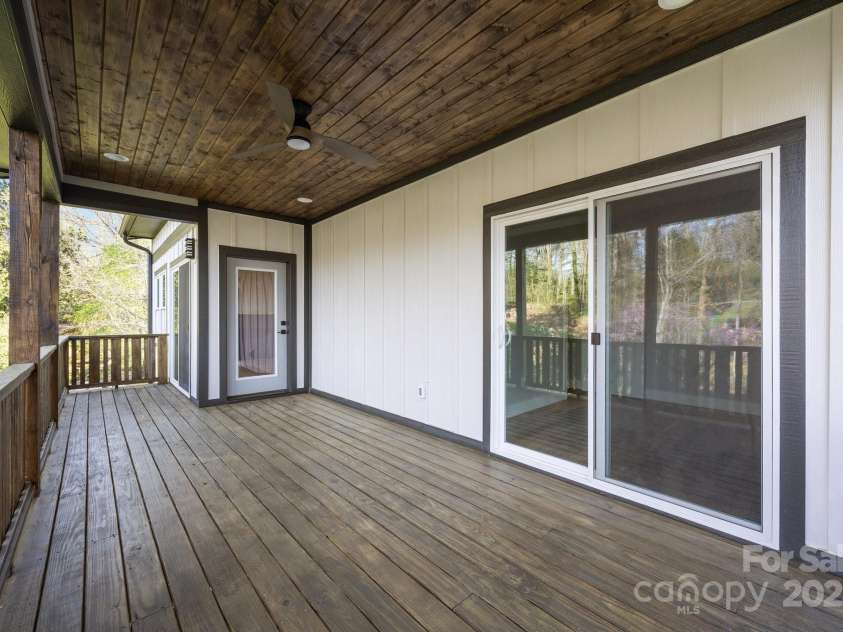 64 Pinedale Road, Asheville, NC 28805.  MLS# CAR4210375, YatesRealty ID 2235. Spacious back deck
