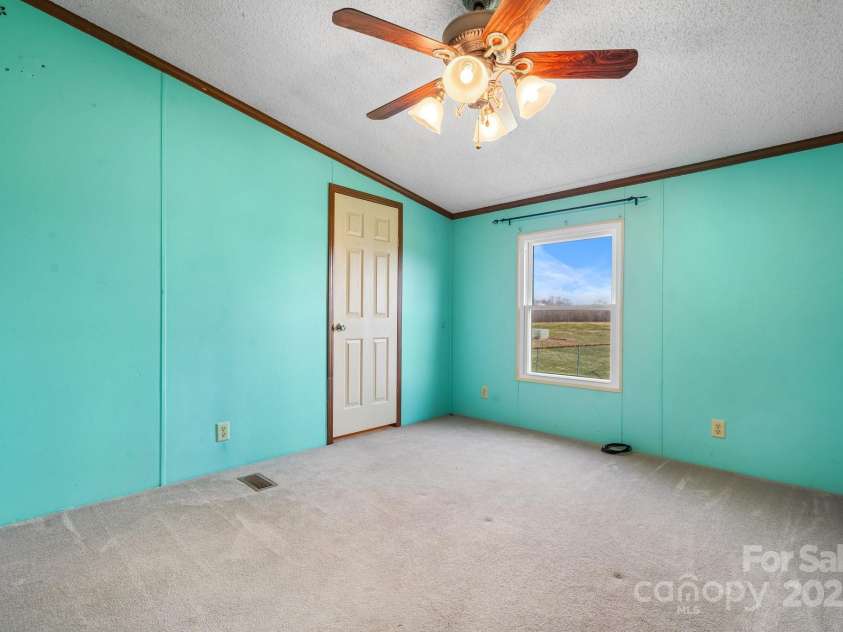 760 Tomlin Mill Road, Statesville, NC 28625.  MLS# CAR4219402, YatesRealty ID 2235. 